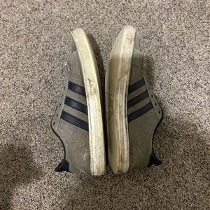 Grey and black Adidas shoes Warren well showed clean up nice.